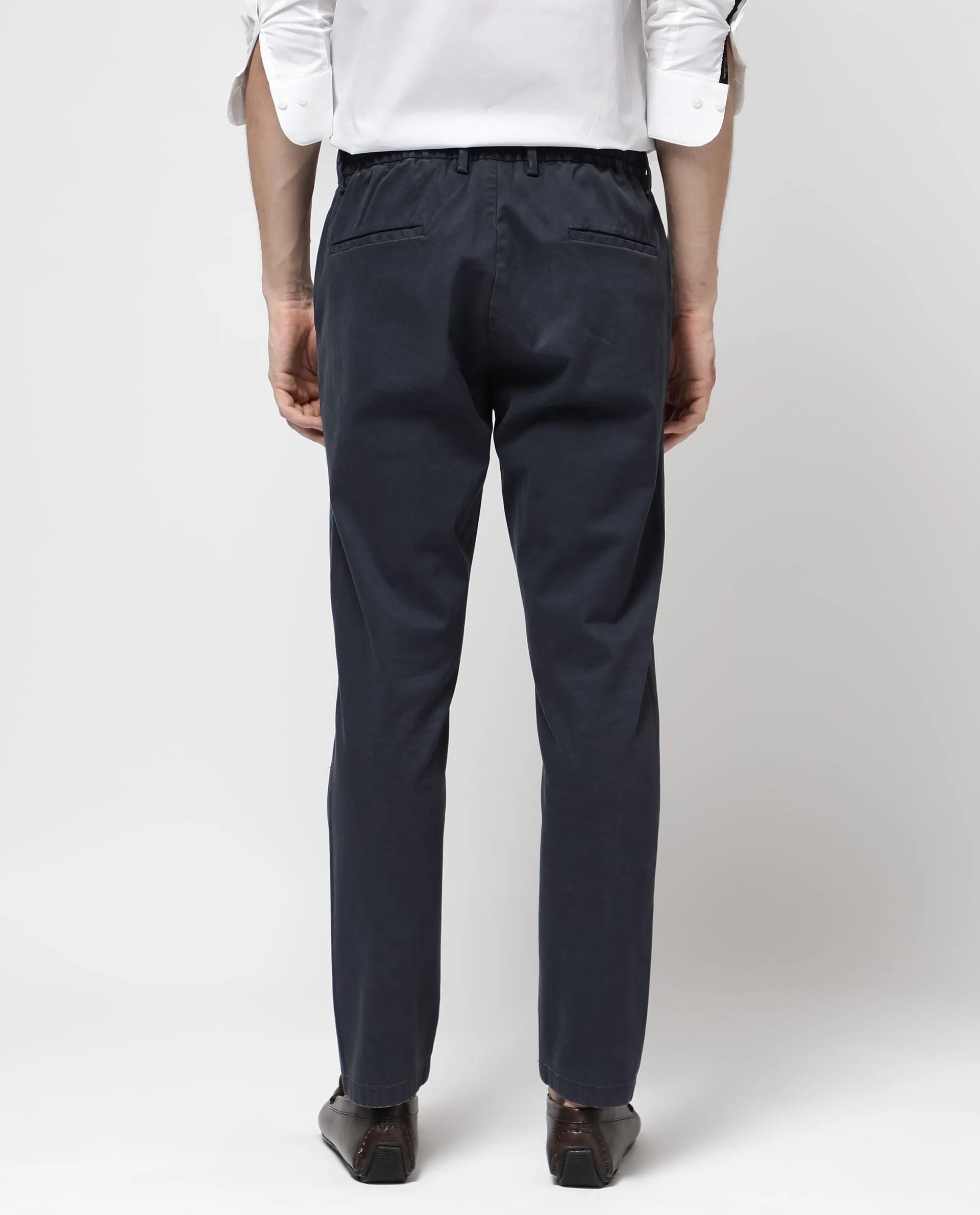Rare Rabbit Mens Orany Navy Cotton Lycra Solid Mid Rise Overdyed Regular Fit Trouser